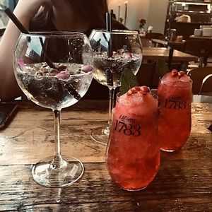 the pic is blurry since uploading it here... but this place has beautiful lighting for instagram photos! gins and strawberry daiquiris  at Natural Bar & Kitchen in Birmingham