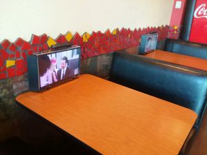 Personal tv's in all booths at BRK Pizza in Naples