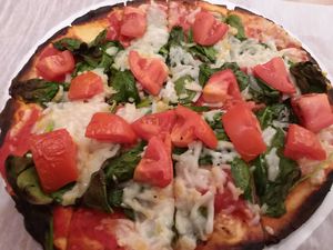 Create your own pizza. Gluten free crust, vegan cheese, spinach, garlic, and tomatoes. at BRK Pizza in Naples