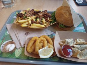 Classic burger onion rings gyoza taboo fries at Khambú Quart in Valencia