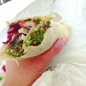 Falafel wrap made vegan, delicious and pretty big!  at Falafel King in Cheltenham
