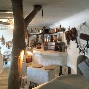 View of the counter/kitchen from a small balcony style seating area. at Teeda in Himeji