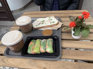 ‘Cheesy' toast, 4 spring rolls, cappuccinos with almond milk at Lifehouse Bistro in Prague