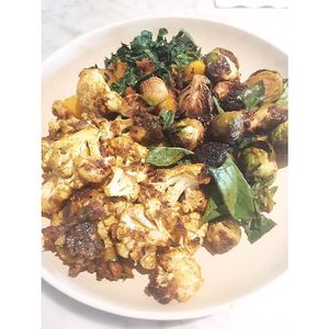 3 vegan side dishes: Roasted Butternut Squash, Yuzu Brussels Sprouts, and Indian Spiced Cauliflower at Flower Child in Del Mar