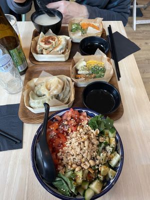 Momo salad, steamed molos, steamed veggies and the lunch menu with stir fried momos, soup and steamed vegetables  at Mo Mo - Saint-Gilles in Brussels