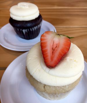 Strawberry Shortcake and Chocolate with vanilla frosting at Molly's Cupcakes in Des Moines