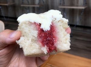 Strawberry puree filling in the Strawberry Shortcake cupcake at Molly's Cupcakes in Des Moines