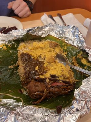 Lumprais (fried rice with cashews, seeni sambol, eggplant moju, plantain curry)   at SpicyZest in Farmers Branch