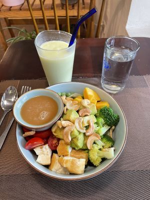 Poke bowl and avocado smoothie with coconut milk  at The Veg - Organic Vego and Tea in Hanoi