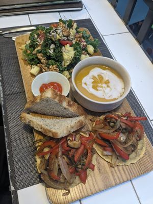 Combo 2: Avo walnut salad, pumpkin soup, toast, mini pizzas (without the vegan cheese due to allergens) at The Veg - Organic Vego and Tea in Hanoi