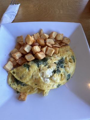 Spinach and feta omelette with side of potatoes   at J Selby's in St Paul