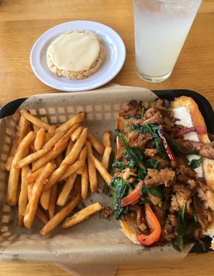 Steak Sandwich with a side of fries. Lemon Olive Oil Tahini Sugar Cookie. Limeade Spritz. at J Selby's in St Paul