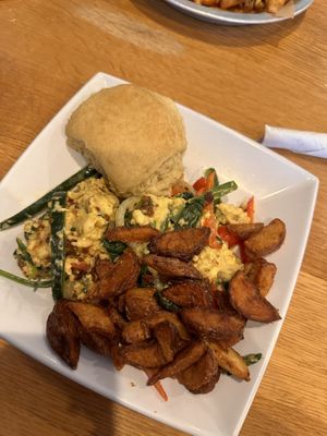 J’s scramble with breakfast potatoes and biscuit   at J Selby's in St Paul