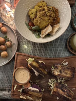Cauliflower head (10/10✨), Garlic Potatoes & eggplant sandwiches (10/10✨)   at Herb Library  in Ubud