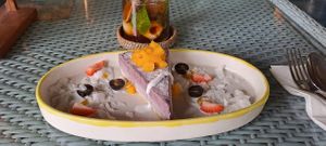 Vegan cheesecake with fruit and coconut cream at Herb Library  in Ubud