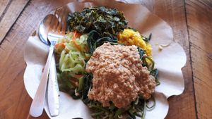 Yellow rice, gado gado, Japanese veggies and the spinach! Was 31k at Mama in 