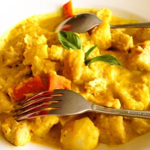 Curry Chicken: Soy white protein simmered with sweet potatos, red potato, taro and yucca in a light curry sauce. at Happy Veggie in Redondo Beach