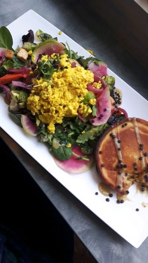 chickpea bread with tofu scramble and salad at Wild Root Cafe in Boise