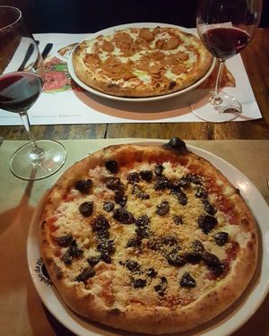 Pizzas Funghi e Pepperoni at Galpao da Pizza in Sao Paulo