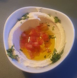 (Cold starter on Lebanese cuisine menu) Hummus: Creamy Chickpeas with Lemon and Sesame Tahini at Ilili in Tenerife