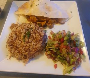 (On the Lebanese cuisine menu) vegan Sharwarma comes with Fattoush (salad) and rice at Ilili in Tenerife