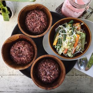 specially requested steamed veggies and watermelon juice in the background.  at Nook in Kerobokan Kelod