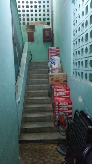 Through the garage and up the stairs... at Veggie Saigon - Vietnam & Thai Vegan Restaurant in Ho Chi Minh City