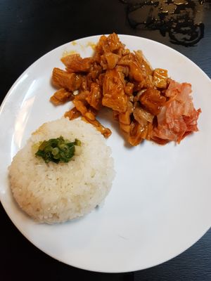 Sticky rice and fried/marinated mix of mushroom and soy. With a bit of kimchi  at Veggie Saigon - Vietnam & Thai Vegan Restaurant in Ho Chi Minh City