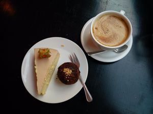 tofu cheesecake with passion fruit, chocolate ball and cereal coffee at Lokal Dela Krem in Warsaw