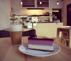 latte  and cake at Lokal Dela Krem in Warsaw