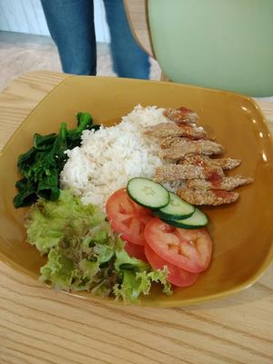 rice  and vegetables dishes. 
 at Harmony Hut International Food in Northeast Singapore
