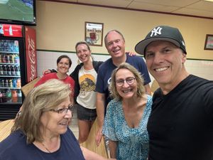 The four of us with Angelica (red tshirt) at the back and her mom Concetta (blue shirt) in front.  at Tony's Pizza & Pasta in Hamburg