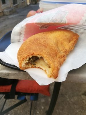 Vegan pie filled with potato, leek and artichoke at Starenio Bakery in Corfu