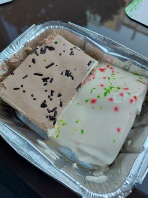 Best cake ever! This is take away, hence the box. at Lisbon Vegan Restaurante in Lisbon