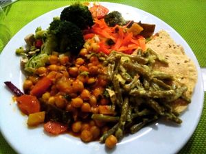 Chickpeas, broccoli, tofu, carrots, pumpkin, green beans in creamy sauce at Lisbon Vegan Restaurante in Lisbon
