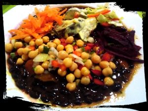 Black beans with carrots, chickpeas, eggplant with potato in creamy sauce and salad at Lisbon Vegan Restaurante in Lisbon