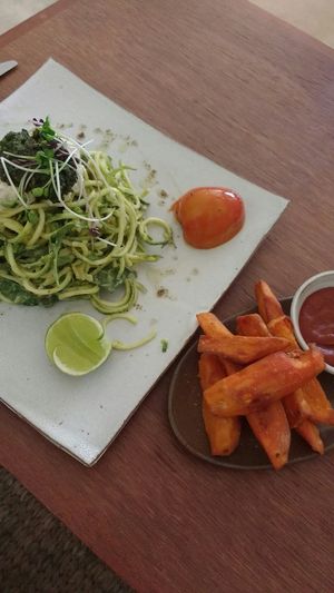 Zucchini noodles and fries at Vibe Cafe in Phnom Penh