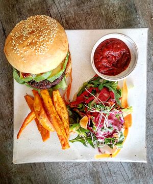 vegan burger and sweet potatoes fries at Vibe Cafe in Phnom Penh