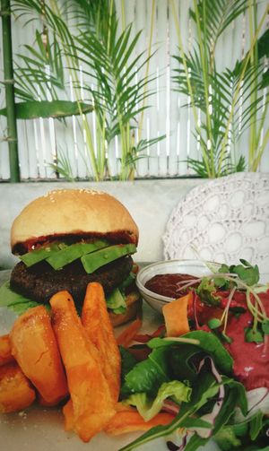 vegan burger and sweet potatoes fries at Vibe Cafe in Phnom Penh