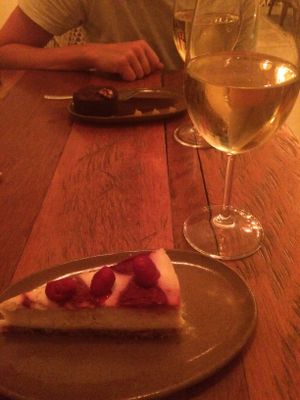 Raspberry cheesecake and wine! at Vibe Cafe in Phnom Penh