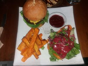 Nomad Burger with sweet potato fries at Vibe Cafe in Phnom Penh