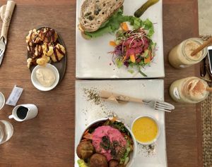 Cauliflower bites, Live Sandwich and Arabian bowl. Plus salted caramel coffee frappe 💋👌 at Vibe Cafe in Phnom Penh