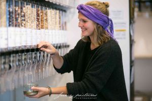 Pull down the black handle an fill your glas at Tante Olga - Organic Zero Waste Store in Cologne