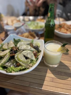 Salad and piña colada  at 100% Natural in Playa Del Carmen