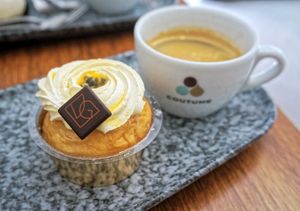 Baba au rhum with mango and passion fruit + coffee at VG Pâtisserie in Paris