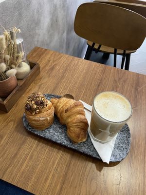 Cruffin, croissant, and latte  at VG Pâtisserie in Paris