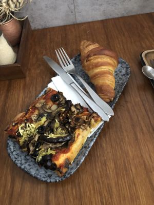 fresh hot pizza + croissant  at VG Pâtisserie in Paris
