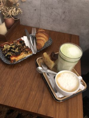 fresh hot pizza + croissant ; matcha and capuccino  at VG Pâtisserie in Paris