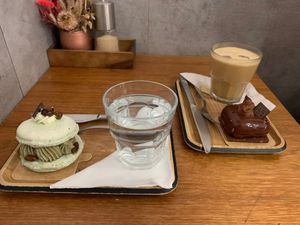 Pistachio left, chocolate patisserie and iced coffee right  at VG Pâtisserie in Paris