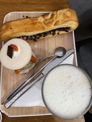 Macaroon, chocolate pastry and latte  at VG Pâtisserie in Paris